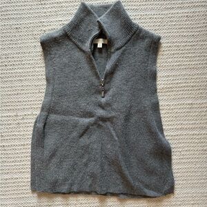 Sleeveless collared vest with open sides
